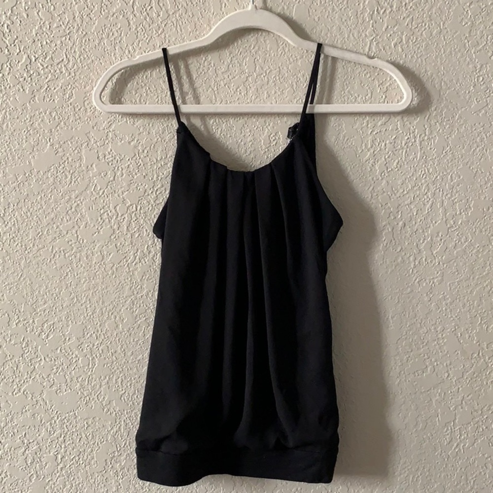 Express black, sleeveless top.
